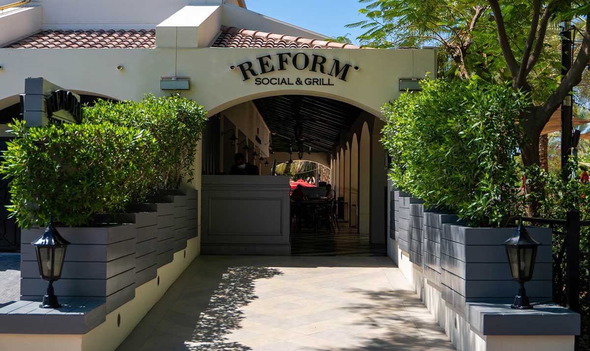 The entrance and terrace of Reform Social & Grill in The Lakes, Dubai